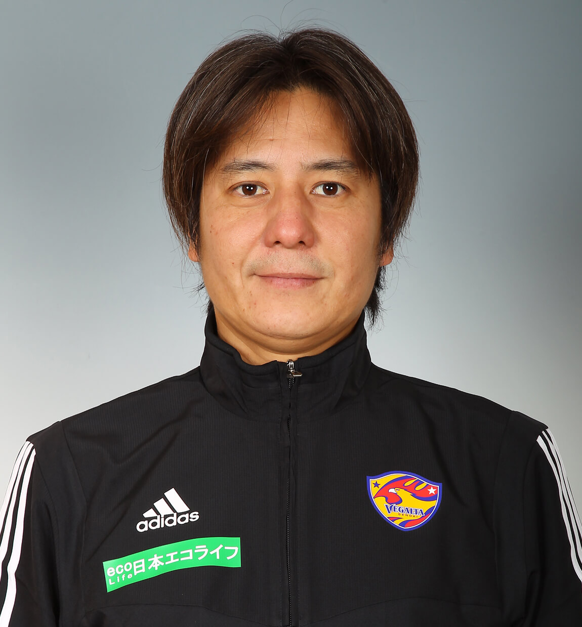 コーチ 吉田 賢太郎の写真を紹介